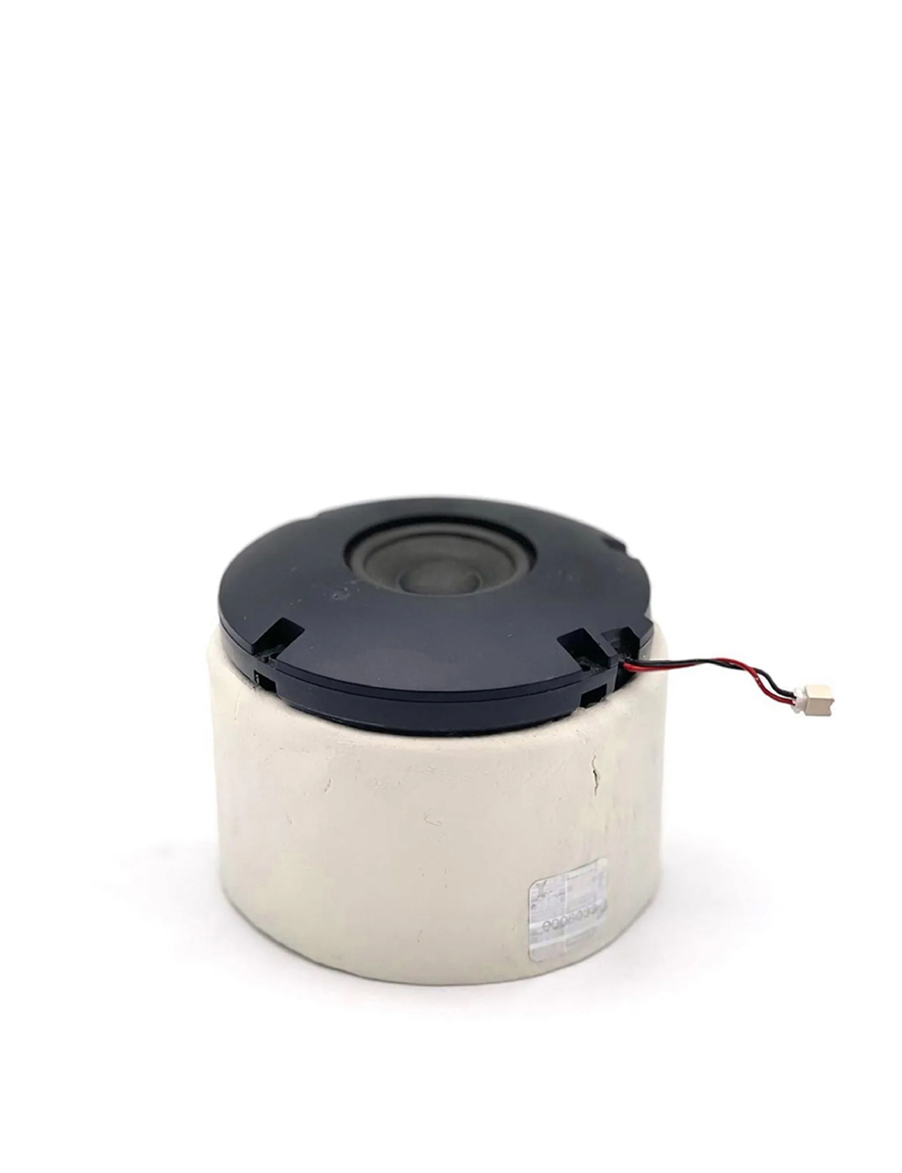 Item for the Great Reset: Silent Speaker, conceptual sculpture by Barbara K. Prokop using a speaker, plastic container, hologram sticker and air drying clay