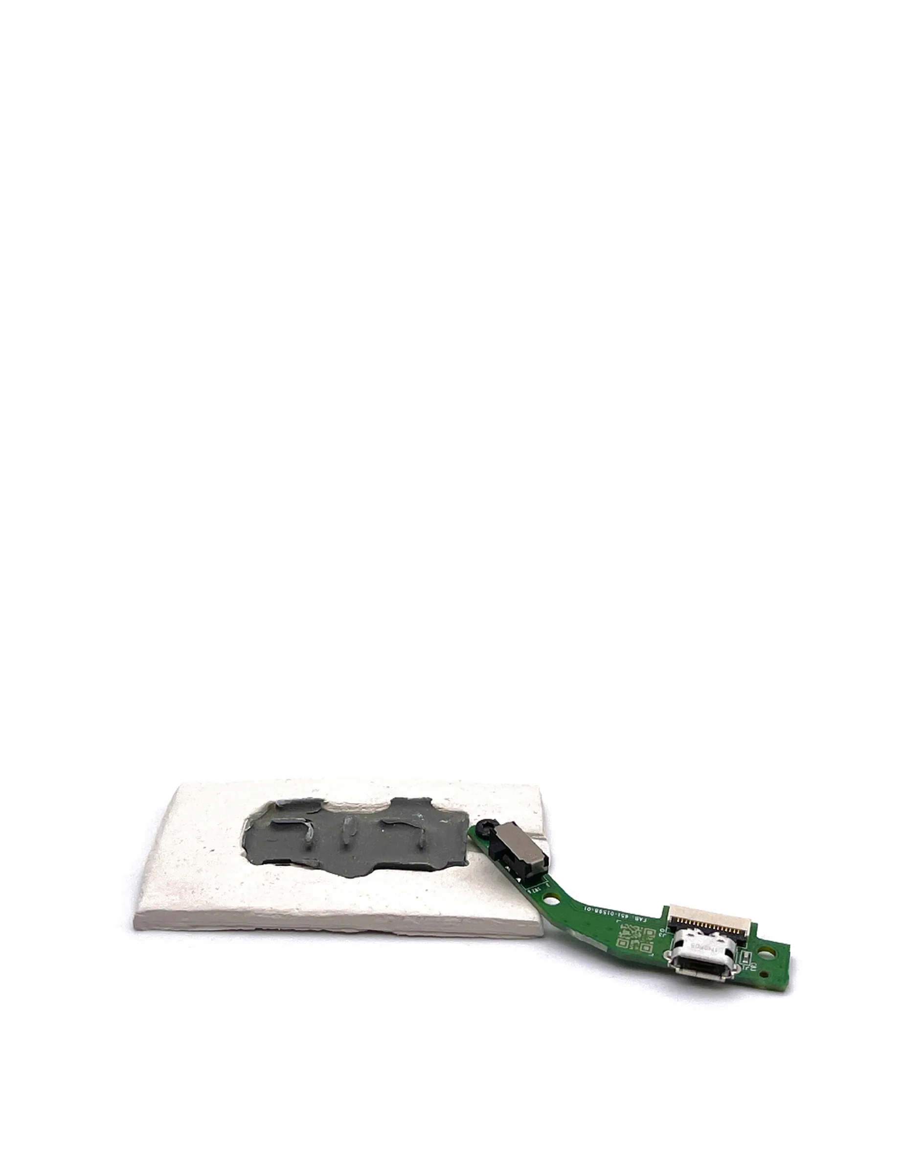Item for the Great Reset: ID Confirmer, conceptual sculpture by Barbara K. Prokop using an electrical component, oil paint cast and air drying clay