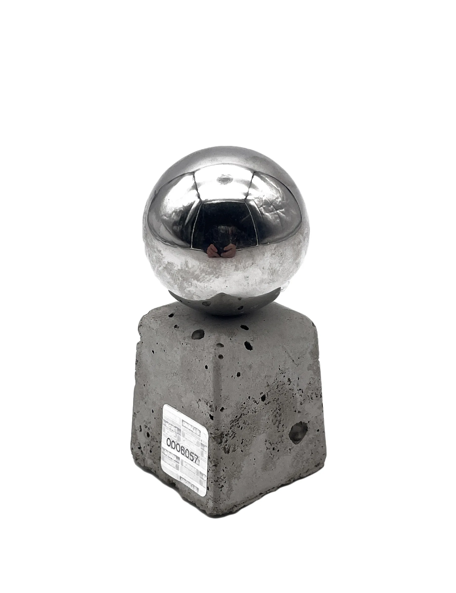 Item for the Great Reset: World Monument, conceptual sculpture by Barbara K. Prokop made from concrete and a metal sphere