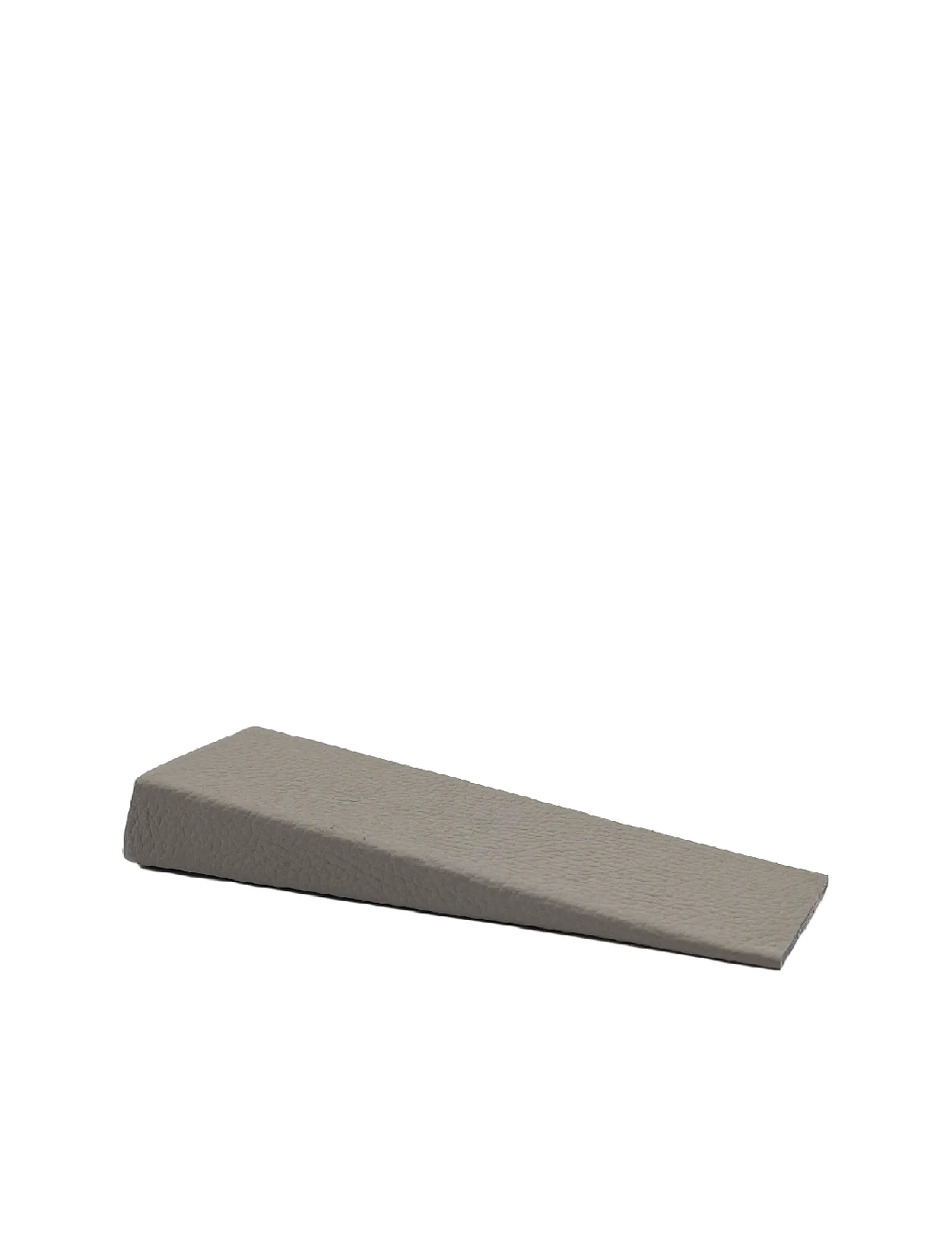 Item for the Great Reset: Stopper Wedge, conceptual sculpture in leather and wood by Barbara K. Prokop
