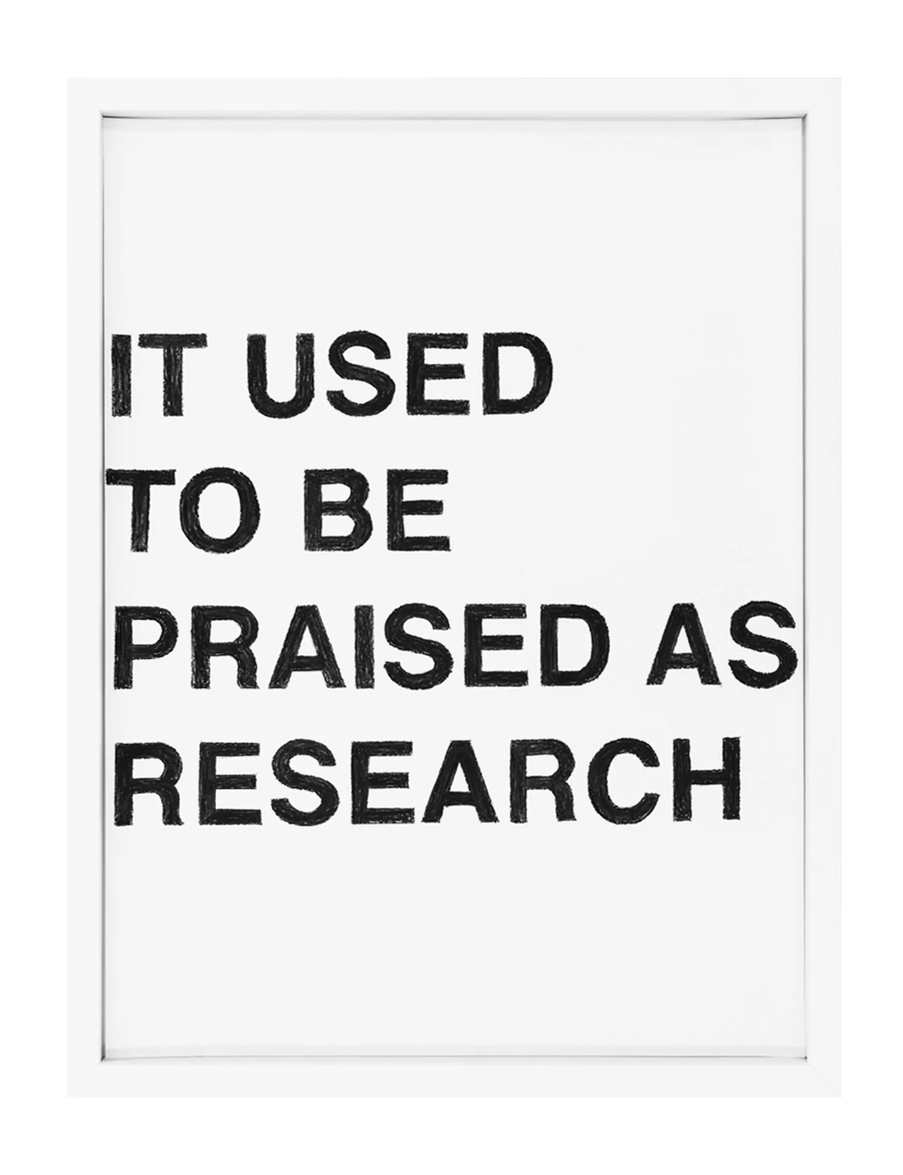 Framed pastel on paper showing black hand-rendered block letters reading "IT USED TO BE PRAISED AS RESEARCH" with grainy strokes and wide white margins — Barbara K. Prokop.